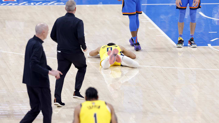 Indiana Pacers guard Tyrese Haliburton lies on ground after injuring himself during Game 7 of the NBA Finals on June 22, 2025.