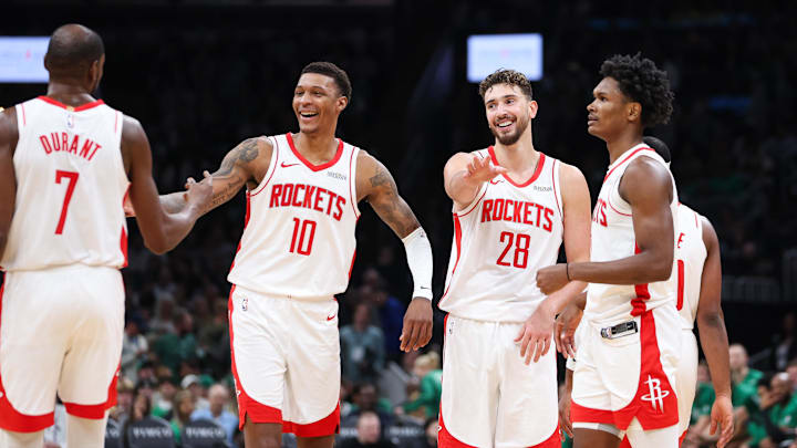 Nov 1, 2025; Boston, Massachusetts, USA; Houston Rockets forward Jabari Smith (10) and center Alperen Sengun (28)  celebrate during the second half against the Boston Celtics at TD Garden. Mandatory Credit: Paul Rutherford-Imagn Images