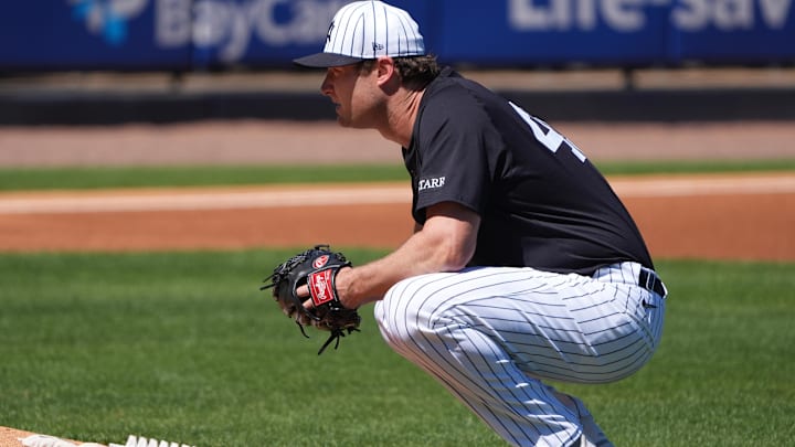 Mar 6, 2025; Tampa, Florida, USA;New York Yankees pitcher Gerrit Cole (45) pauses before taking the mound against the Minnesota Twins during the first inning  at George M. Steinbrenner Field. Mandatory Credit: Dave Nelson-Imagn Images
