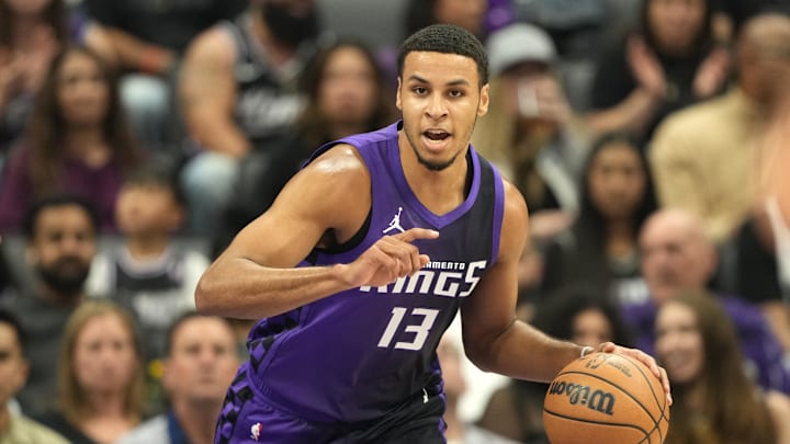 Apr 11, 2025; Sacramento, California, USA; Sacramento Kings forward Keegan Murray (13) dribbles against the Los Angeles Clippers during the first quarter at Golden 1 Center. Mandatory Credit: Darren Yamashita-Imagn Images