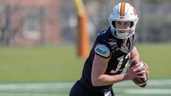 Drew Mestemaker (17) runs drills during Oklahoma State football practice in Stillwater, Okla., on Tuesday, March 24, 2026.