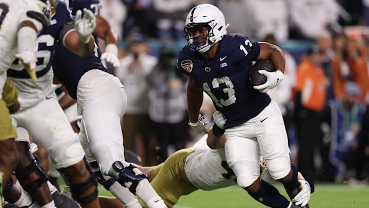 Penn State Nittany Lions running back Kaytron Allen (13) runs the ball in the first half against the Notre Dame Fighting Irish in the Orange Bowl at Hard Rock Stadium. 