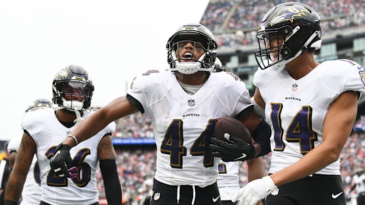 Sep 25, 2022; Foxborough, Massachusetts, USA; Baltimore Ravens cornerback Marlon Humphrey (44) celebrates after intercepting a pass thrown by New England Patriots quarterback Mac Jones (not seen) during the second half at Gillette Stadium. Mandatory Credit: Brian Fluharty-Imagn Images