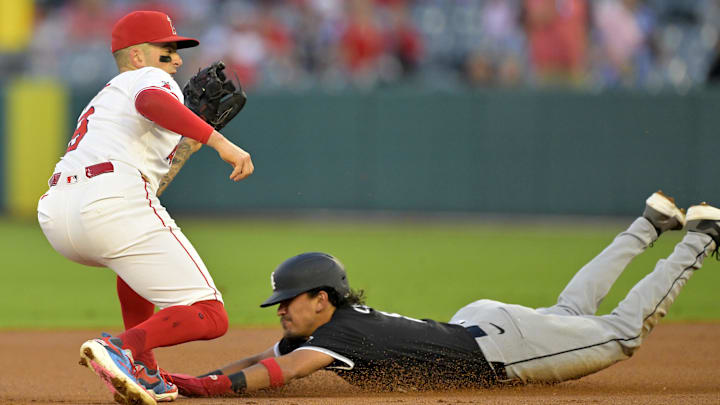 Sep 17, 2024; Anaheim, California, USA;  Chicago White Sox shortstop Nicky Lopez (8) is caught stealing by Los Angeles Angels shortstop Zach Neto (9) in the first inning at Angel Stadium. Mandatory Credit: Jayne Kamin-Oncea-Imagn Images