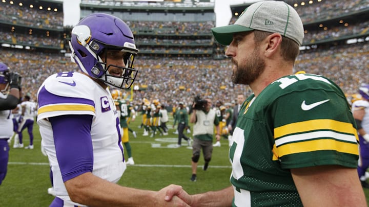 Sep 15, 2019; Green Bay, WI, USA; Minnesota Vikings quarterback Kirk Cousins (8) greets Green Bay Packers quarterback Aaron Rodgers (12) on the field following the game at Lambeau Field. Mandatory Credit: Jeff Hanisch-Imagn Images Sep 15, 2019; Green Bay, WI, USA; Minnesota Vikings quarterback Kirk Cousins (8) greets Green Bay Packers quarterback Aaron Rodgers (12) on the field following the game at Lambeau Field. Mandatory Credit: Jeff Hanisch-Imagn Images