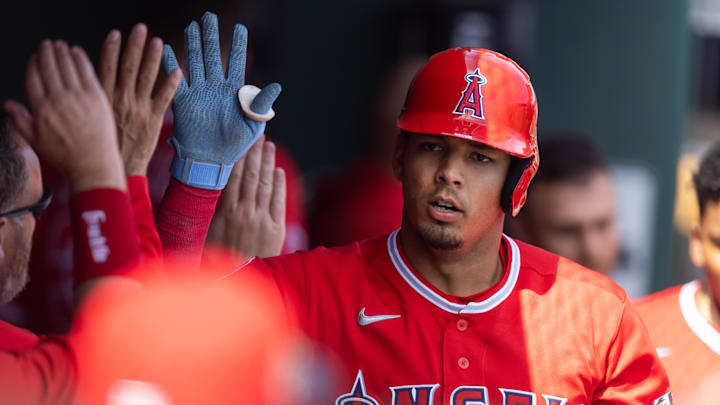 Mar 1, 2026; Phoenix, Arizona, USA; Los Angeles Angels designated hitter Vaughn Grissom celebrates with teammates in the dugout after hitting a home run against the Los Angeles Dodgers during a spring training game at Camelback Ranch-Glendale. Mandatory Credit: Mark J. Rebilas-Imagn Images