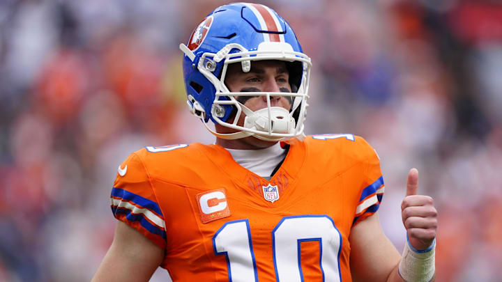 Oct 26, 2025; Denver, Colorado, USA; Denver Broncos quarterback Bo Nix (10) reacts in the first quarter against the Dallas Cowboys at Empower Field at Mile High. 