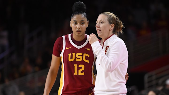 Feb 13, 2025; Los Angeles, California, USA; USC Trojans guard JuJu Watkins (12) and head coach Lindsay Gottlieb during the second half against the UCLA Bruins at Galen Center. 