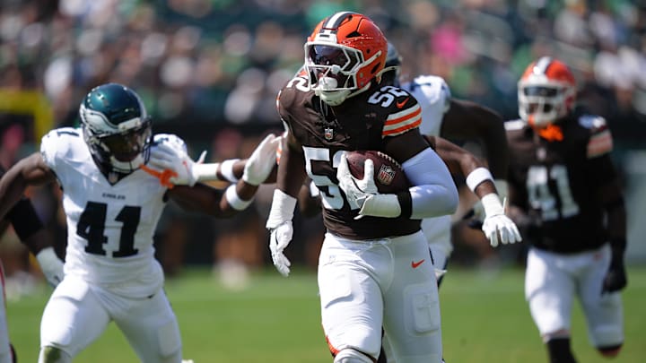 Aug 16, 2025; Philadelphia, Pennsylvania, USA; Cleveland Browns defensive lineman K.J. Henry (52) returns an interception for a touchdown against the Philadelphia Eagles in the second half at Lincoln Financial Field. Mandatory Credit: Kyle Ross-Imagn Images
