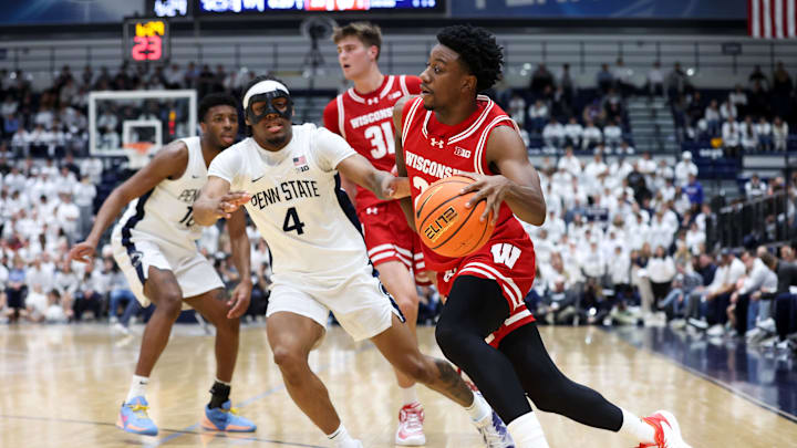 Jan 22, 2026; University Park, Pennsylvania, USA; Wisconsin Badgers guard John Blackwell (25) drives during the first half against the Penn State Nittany Lions at Rec Hall. 