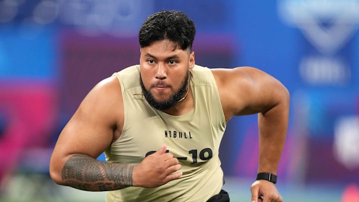 Mar 3, 2024; Indianapolis, IN, USA; Washington offensive lineman Troy Fautanu (OL19) during the 2024