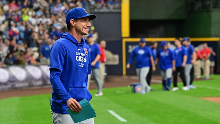 May 27, 2024; Milwaukee, Wisconsin, USA; Chicago Cubs manager Craig Counsell brings out the lineup card before game against the Milwaukee Brewers at American Family Field.