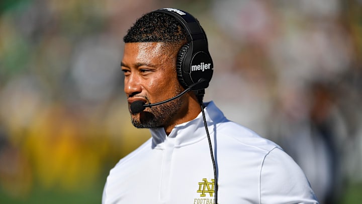 Sep 7, 2024; South Bend, Indiana, USA; Notre Dame Fighting Irish head coach Marcus Freeman walks to the sideline in the second quarter against the Northern Illinois Huskies at Notre Dame Stadium. Sep 7, 2024; South Bend, Indiana, USA; Notre Dame Fighting Irish head coach Marcus Freeman walks to the sideline in the second quarter against the Northern Illinois Huskies at Notre Dame Stadium.