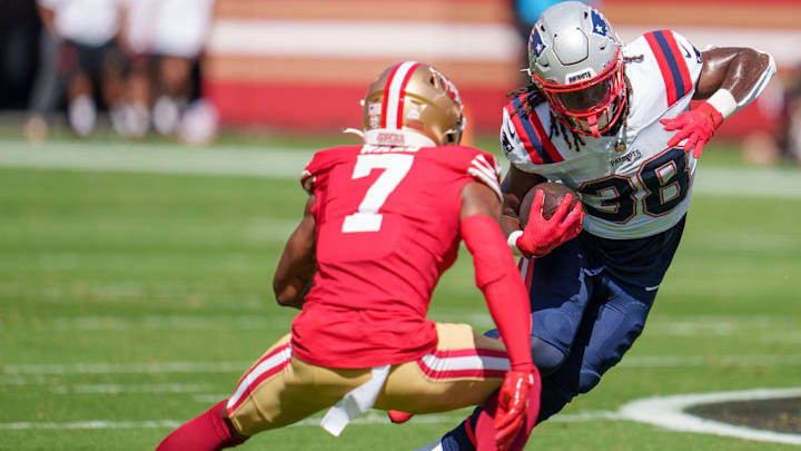 Sep 29, 2024; Santa Clara, California, USA; New England Patriots running back Rhamondre Stevenson (38) is tackled by San Francisco 49ers cornerback Charvarius Ward (7) during the first quarter at Levi's Stadium. Mandatory Credit: Neville E. Guard-Imagn Images