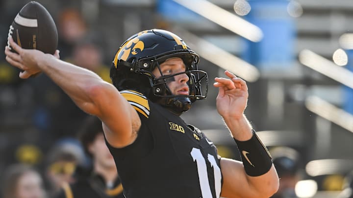 Iowa Hawkeyes quarterback Mark Gronowski (11) Iowa Hawkeyes quarterback Mark Gronowski (11)