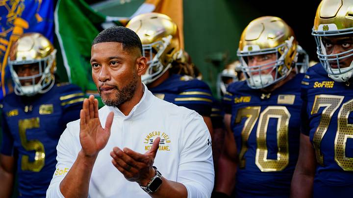 Notre Dame head coach Marcus Freeman waits to take the field with his team before a game against Wisconsin on Sunday, Sept. 6, 2026, at Lambeau Field in Green Bay, Wisconsin. Notre Dame won the game, 41-13. Notre Dame head coach Marcus Freeman waits to take the field with his team before a game against Wisconsin on Sunday, Sept. 6, 2026, at Lambeau Field in Green Bay, Wisconsin. Notre Dame won the game, 41-13.