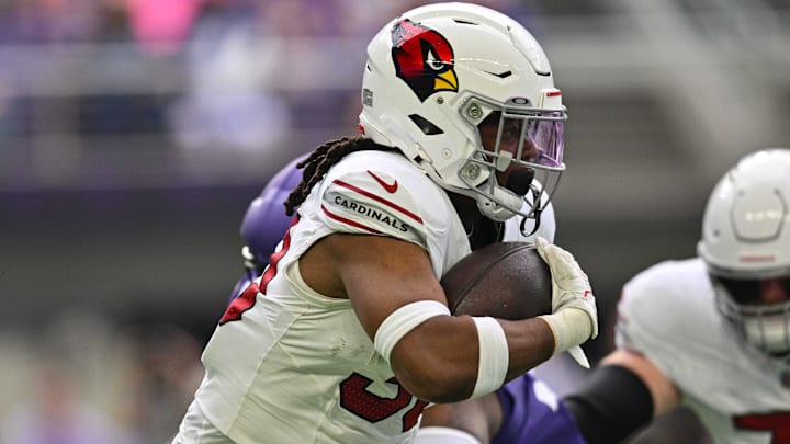 Aug 26, 2023; Minneapolis, Minnesota, USA; Arizona Cardinals running back Keaontay Ingram (30) runs