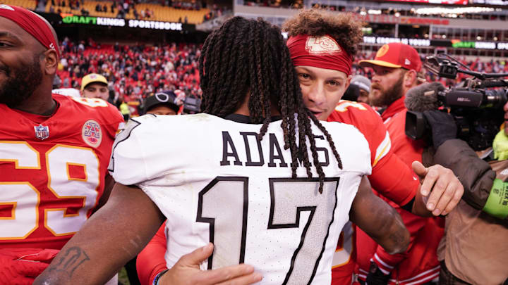 Dec 25, 2023; Kansas City, Missouri, USA; Kansas City Chiefs quarterback Patrick Mahomes (15) embraces Las Vegas Raiders wide receiver Davante Adams (17) after the game at GEHA Field at Arrowhead Stadium. Mandatory Credit: Denny Medley-Imagn Images