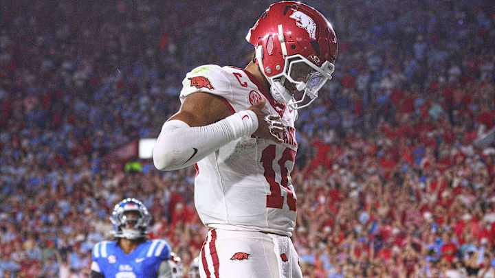 Sep 13, 2025; Oxford, Mississippi, USA; Arkansas Razorback quarterback Taylen Green (10) reacts after running for a touchdown during the second quarter against the Mississippi Rebels at Vaught-Hemingway Stadium. Mandatory Credit: Petre Thomas-Imagn Images