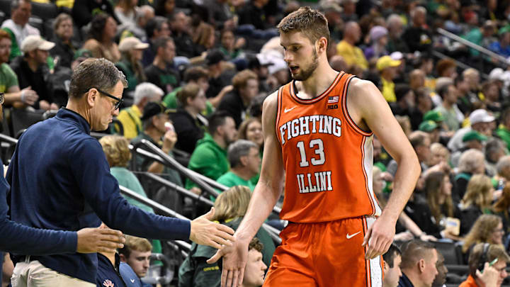 Jan 2, 2025; Eugene, Oregon, USA; Illinois Fighting Illini center Tomislav Ivisic (13) goes to the bench during the second half against the Oregon Ducks at Matthew Knight Arena. Mandatory Credit: Craig Strobeck-Imagn Images