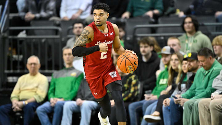 Feb 25, 2026; Eugene, Oregon, USA; Wisconsin Badgers guard Nick Boyd (2) dribbles the ball during the first half against the Oregon Ducks at Matthew Knight Arena. Feb 25, 2026; Eugene, Oregon, USA; Wisconsin Badgers guard Nick Boyd (2) dribbles the ball during the first half against the Oregon Ducks at Matthew Knight Arena.