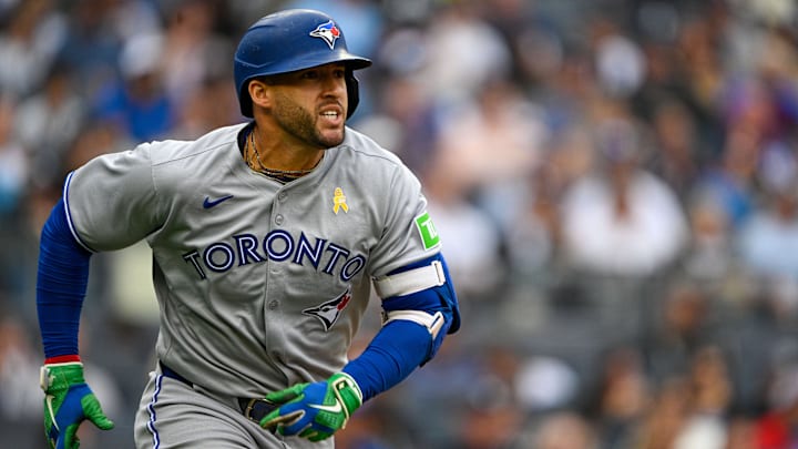 Sep 7, 2025; Bronx, New York, USA; Toronto Blue Jays right fielder George Springer (4) hits for a double during the third inning against the New York Yankees at Yankee Stadium. 