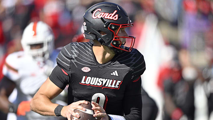 Oct 19, 2024; Louisville, Kentucky, USA; Louisville Cardinals quarterback Tyler Shough (9) looks to pass against the Miami Hurricanes during the first quarter at L&N Federal Credit Union Stadium. Mandatory Credit: Jamie Rhodes-Imagn Images