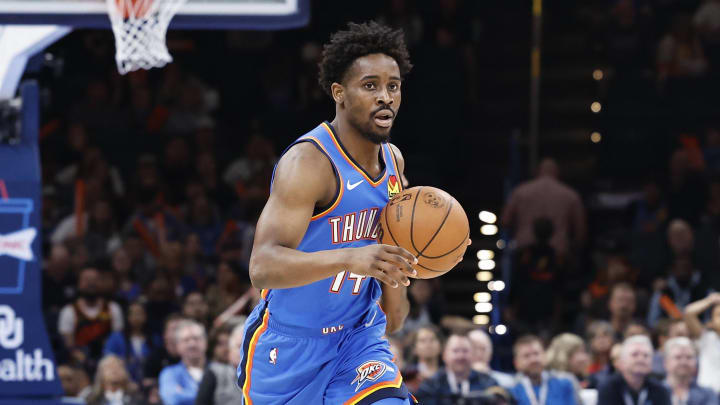Apr 10, 2024; Oklahoma City, Oklahoma, USA; Oklahoma City Thunder forward Adam Flagler (14) dribbles the ball down the court against the San Antonio Spurs during the second half at Paycom Center. Mandatory Credit: Alonzo Adams-USA TODAY Sports