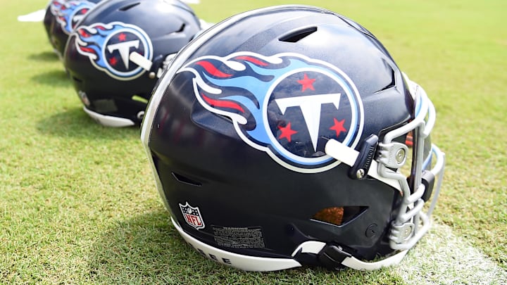 Jul 29, 2023; Nashville, TN, USA; View of helmets on the field as Tennessee Titans players finish training camp practice. Mandatory Credit: Christopher Hanewinckel-Imagn Images
