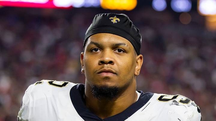 Former New Orleans Saints defensive end Marcus Davenport (92) looks on