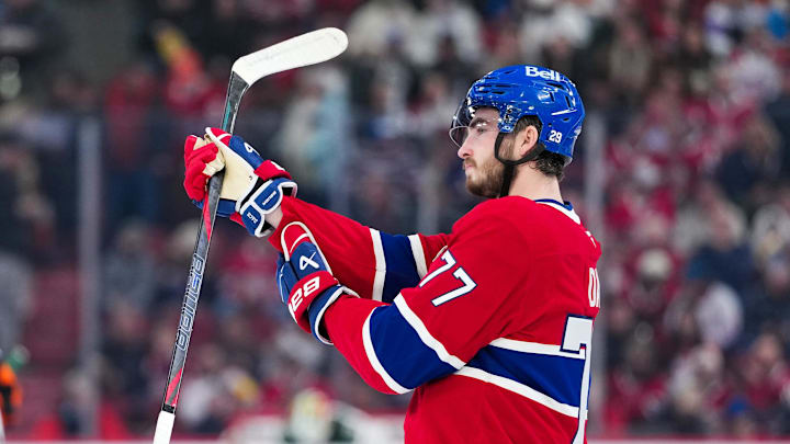 Jan 20, 2026; Montreal, Quebec, CAN; Montreal Canadiens forward Kirby Dach (77) steps on the ice during the first period of the game against the Minnesota Wild at the Bell Centre. Mandatory Credit: Eric Bolte-Imagn Images