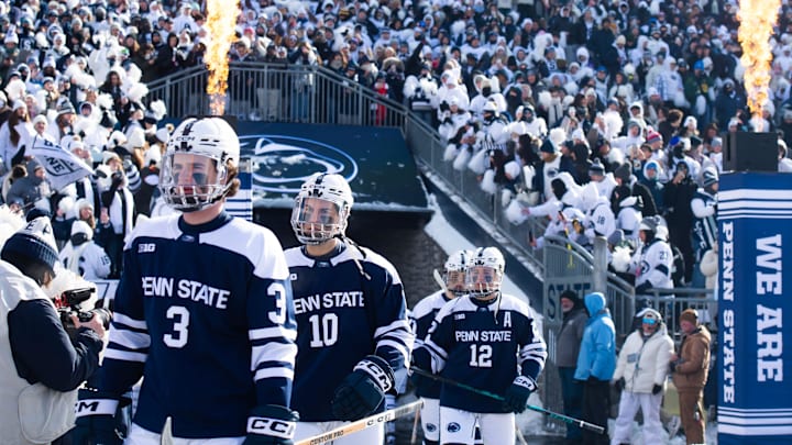 Penn State Nittany Lions ice hockey players enter Beaver Stadium for a top-five Big Ten game against Michigan State. Penn State Nittany Lions ice hockey players enter Beaver Stadium for a top-five Big Ten game against Michigan State.