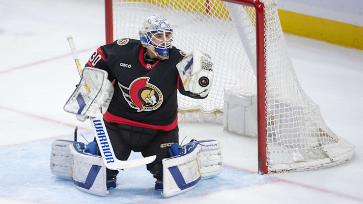 Sep 26, 2024; Ottawa, Ontario, CAN; Ottawa Senators goalie Dustin Tokarski (30) makes a save in the third period against the Buffalo Sabres at the Canadian Tire Centre. Mandatory Credit: Marc DesRosiers-Imagn Images