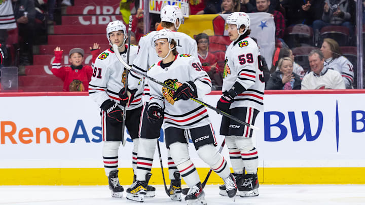 Apr 15, 2025; Ottawa, Ontario, CAN; Chicago Blackhawks center Connor Bedard (98) skates to the bench after scoring a goal in the second period against the  Ottawa Senators at the Canadian Tire Centre. Mandatory Credit: Marc DesRosiers-Imagn Images