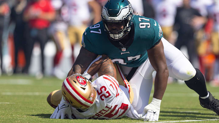 San Francisco 49ers running back Elijah Mitchell (25) is tackles by Philadelphia Eagles defensive tackle Javon Hargrave (97)