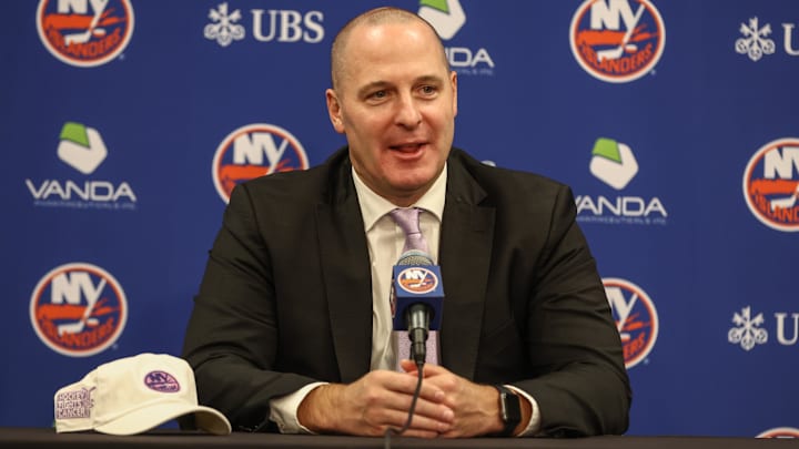 Nov 22, 2025; Elmont, New York, USA; New York Islanders General Manager Mathieu Darche speaks with fans at a pre-game event prior to the game against the St. Louis Blues at UBS Arena. Mandatory Credit: Wendell Cruz-Imagn Images