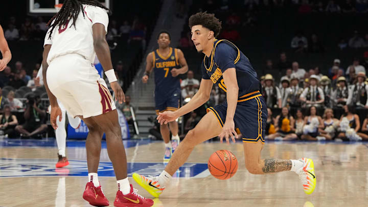 Mar 11, 2026; Charlotte, NC, USA; California Golden Bears guard Justin Pippen (10) with the ball as Florida State Seminoles guard Robert McCray V. (6) defends in the first half at Spectrum Center. Mandatory Credit: Bob Donnan-Imagn Images