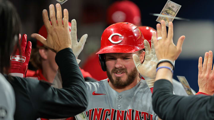 Apr 21, 2025; Miami, Florida, USA; Cincinnati Reds left fielder Gavin Lux (2) celebrates with teammates after hitting a two-run home run against the Miami Marlins during the eighth inning at loanDepot Park. Mandatory Credit: Sam Navarro-Imagn Images