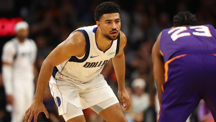 Dec 27, 2024; Phoenix, Arizona, USA; Dallas Mavericks guard Quentin Grimes (5) against the Phoenix Suns at Footprint Center. Mandatory Credit: Mark J. Rebilas-Imagn Images