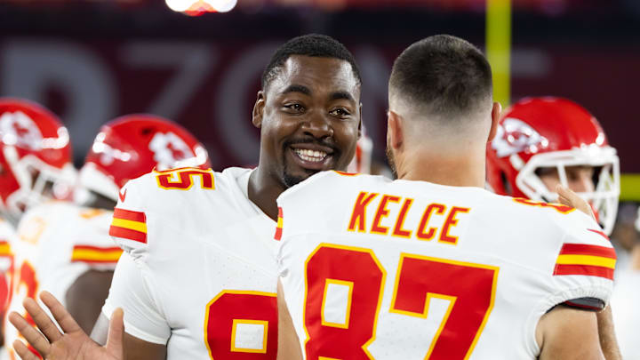 Aug 9, 2025; Glendale, Arizona, USA; Kansas City Chiefs defensive tackle Chris Jones (95) with tight end Travis Kelce (87) against the Arizona Cardinals during a preseason NFL game at State Farm Stadium. Mandatory Credit: Mark J. Rebilas-Imagn Images