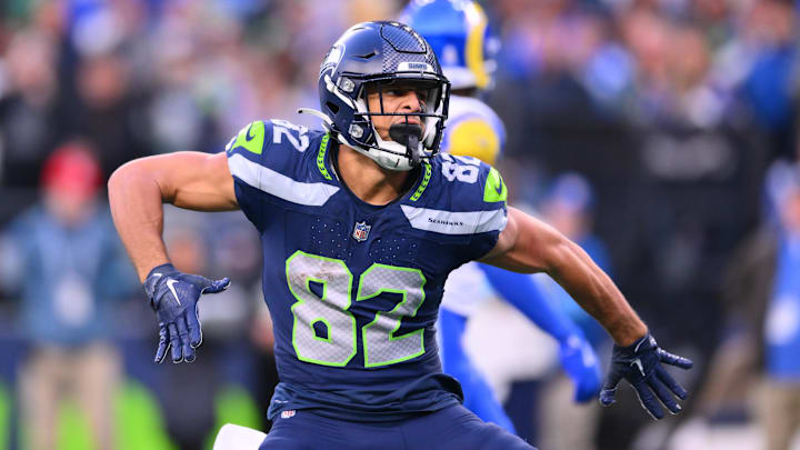 Nov 3, 2024; Seattle, Washington, USA; Seattle Seahawks wide receiver Cody White (82) celebrates after making a catch against the Los Angeles Rams during the second half at Lumen Field. Mandatory Credit: Steven Bisig-Imagn Images
