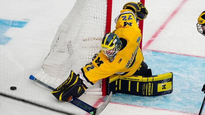 Apr 9, 2026; Las Vegas, Nevada, UNITED STATES; Michigan Wolverines goalie Jack Ivankovic (72) reaches for the puck in double overtime against the Denver Pioneers in the semifinals of the Frozen Four at T-Mobile Arena. Apr 9, 2026; Las Vegas, Nevada, UNITED STATES; Michigan Wolverines goalie Jack Ivankovic (72) reaches for the puck in double overtime against the Denver Pioneers in the semifinals of the Frozen Four at T-Mobile Arena.