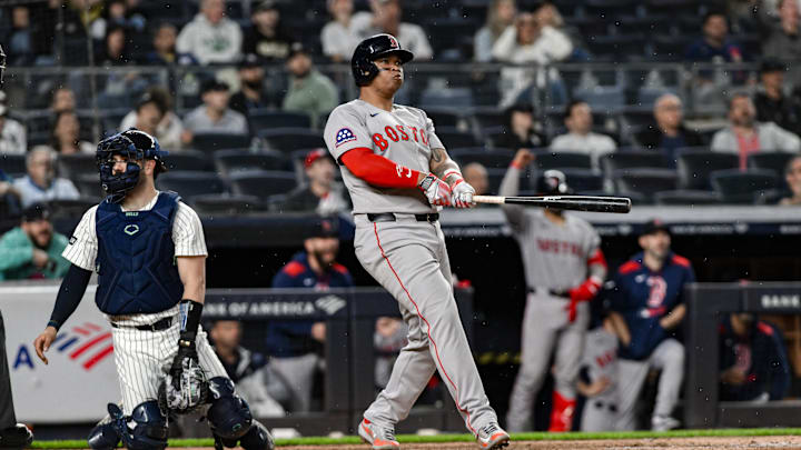 Jun 8, 2025; Bronx, New York, USA; Boston Red Sox designated hitter Rafael Devers (11) reacts after hitting a solo home run against the New York Yankees during the ninth inning at Yankee Stadium. Mandatory Credit: John Jones-Imagn Images