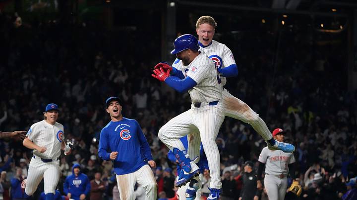 May 5, 2026; Chicago, Illinois, USA; Chicago Cubs first baseman Michael Busch (29) celebrates his walk-off single during the tenth inning against the Cincinnati Reds with center fielder Pete Crow-Armstrong (4)  at Wrigley Field. Mandatory Credit: David Banks-Imagn Images