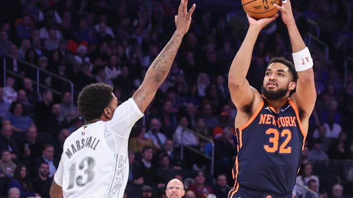 Mar 25, 2025; New York, New York, USA; New York Knicks center Karl-Anthony Towns (32) shoots past Dallas Mavericks forward Naji Marshall (13) in the first quarter at Madison Square Garden. Mandatory Credit: Wendell Cruz-Imagn Images Mar 25, 2025; New York, New York, USA; New York Knicks center Karl-Anthony Towns (32) shoots past Dallas Mavericks forward Naji Marshall (13) in the first quarter at Madison Square Garden. Mandatory Credit: Wendell Cruz-Imagn Images