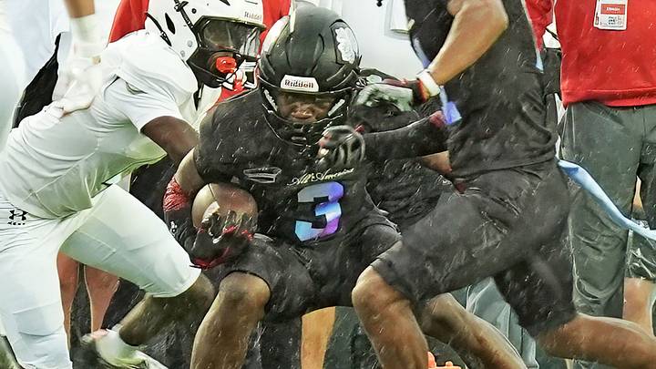 Team Rose’s Easton Royal (03) looks for an opening down the field during the Under Armour All-America Game Saturday, Jan. 3, 2026 at Spec Martin Stadium in DeLand.