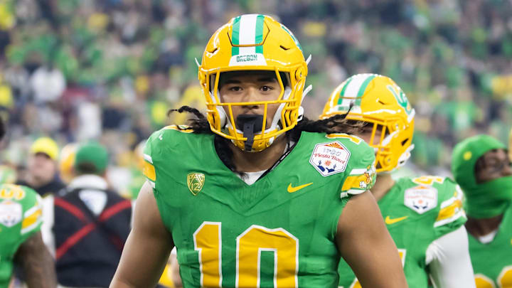 Jan 1, 2024; Glendale, AZ, USA; Oregon Ducks defensive end Matayo Uiagalelei (10) against the Liberty Flames during the 2024 Fiesta Bowl at State Farm Stadium. Mandatory Credit: Mark J. Rebilas-Imagn Images