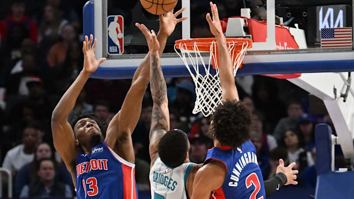 Mar 11, 2024; Detroit, Michigan, USA;  Detroit Pistons guard Cade Cunningham (2) and center James Wiseman
