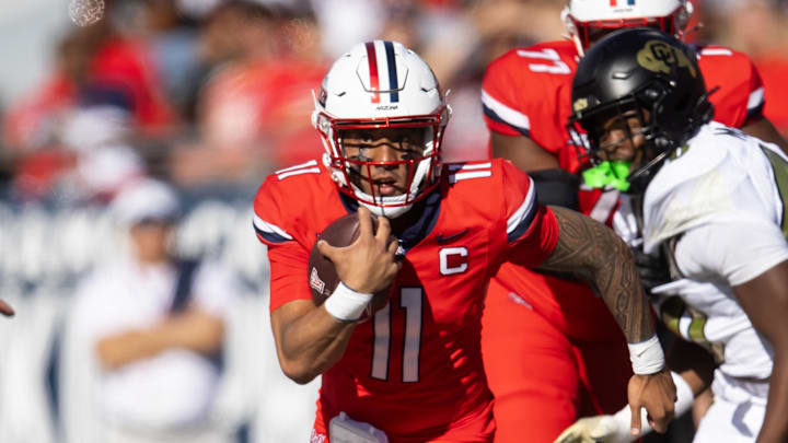 Oct 19, 2024; Tucson, Arizona, USA; Arizona Wildcats quarterback Noah Fifita (11) against the Colorado Buffalos at Arizona Stadium. Mandatory Credit: Mark J. Rebilas-Imagn Images