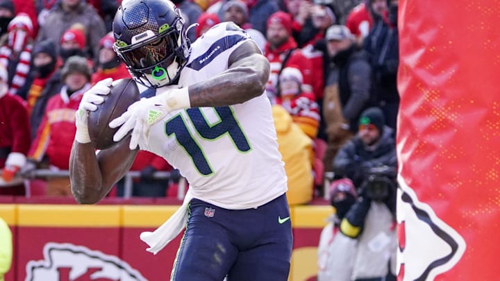 Dec 24, 2022; Kansas City, Missouri, USA; Seattle Seahawks wide receiver DK Metcalf (14) catches a pass in the end zone but lands out of bounds against the Kansas City Chiefs during the game at GEHA Field at Arrowhead Stadium. Mandatory Credit: Denny Medley-Imagn Images